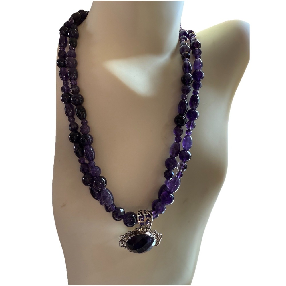 Double stranded amethyst beads with sterling and amethyst pendant 24-27" DRT